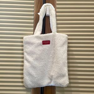 This faux fur tote is just fun!